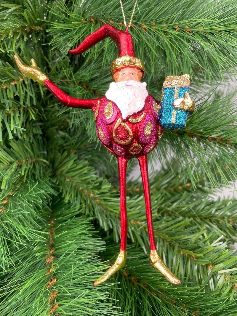 Baumschmuck  Weihnachtsmann mit langen Beinen und einem Geschenk 17 cm rot-gold Christbaumschmuck